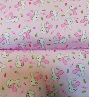Тканина для дитячої постільної білизни, зайчики на рожевому фоні/цукерки | Textile Plaza