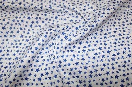 Бавовна кольорова сині дрібні зірочки на білому | Textile Plaza