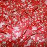 Креп-шифон мелкая россыпь из розовых цветов на красном фоне | Textile Plaza