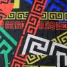 Жаккард VERSACE яркий геометрический принт на черном фоне | Textile Plaza